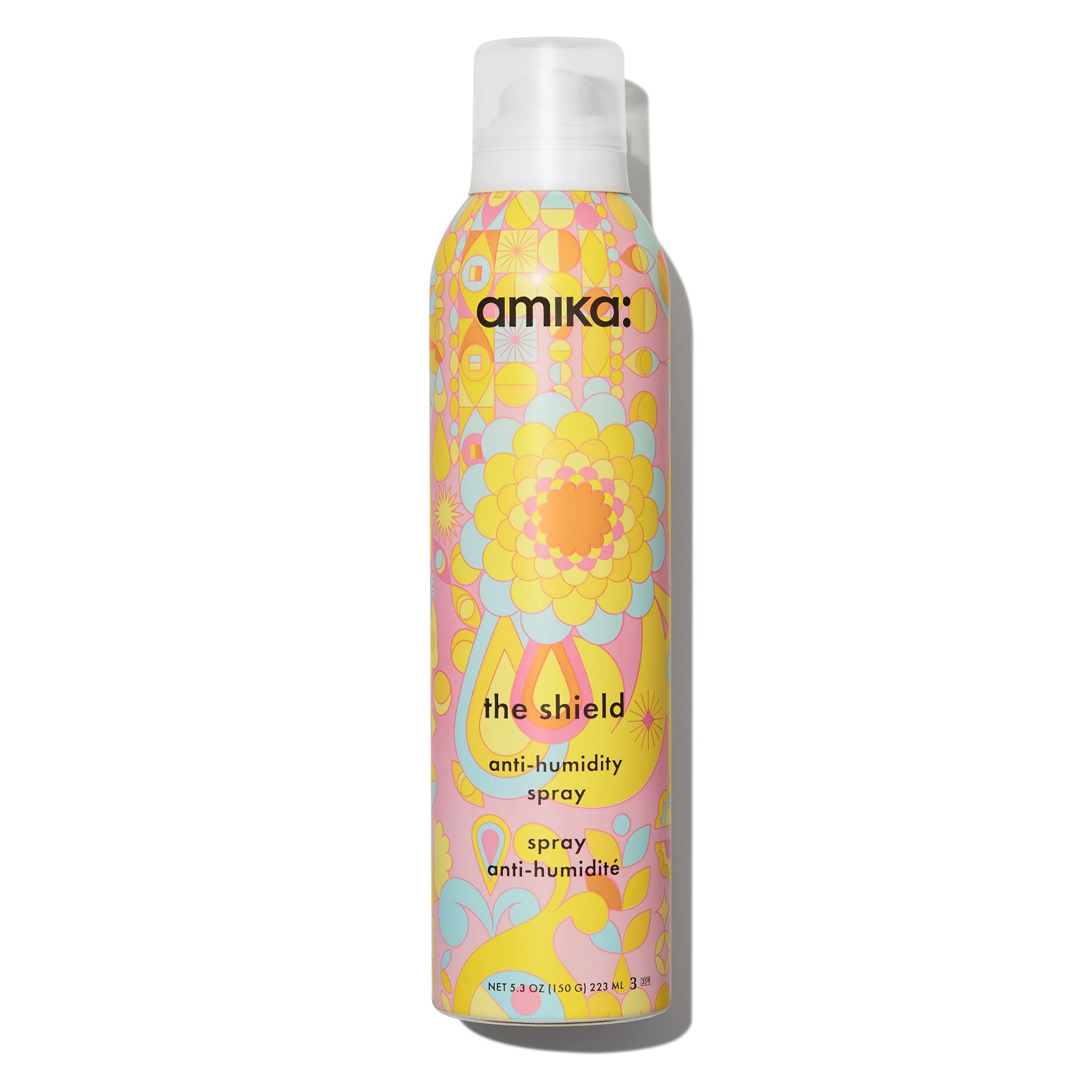 Amika Shield bottle front shows lightweight humidity protection for all-day smoothness.