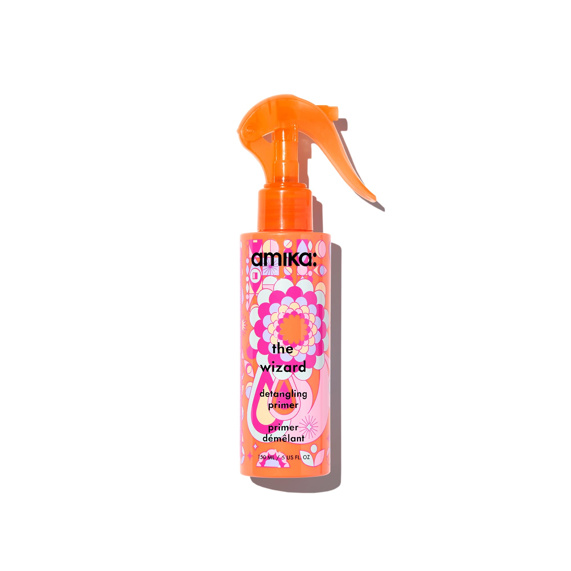 Amika The Wizard Detangling Hair Primer bottle ready for detangling and heat protection.