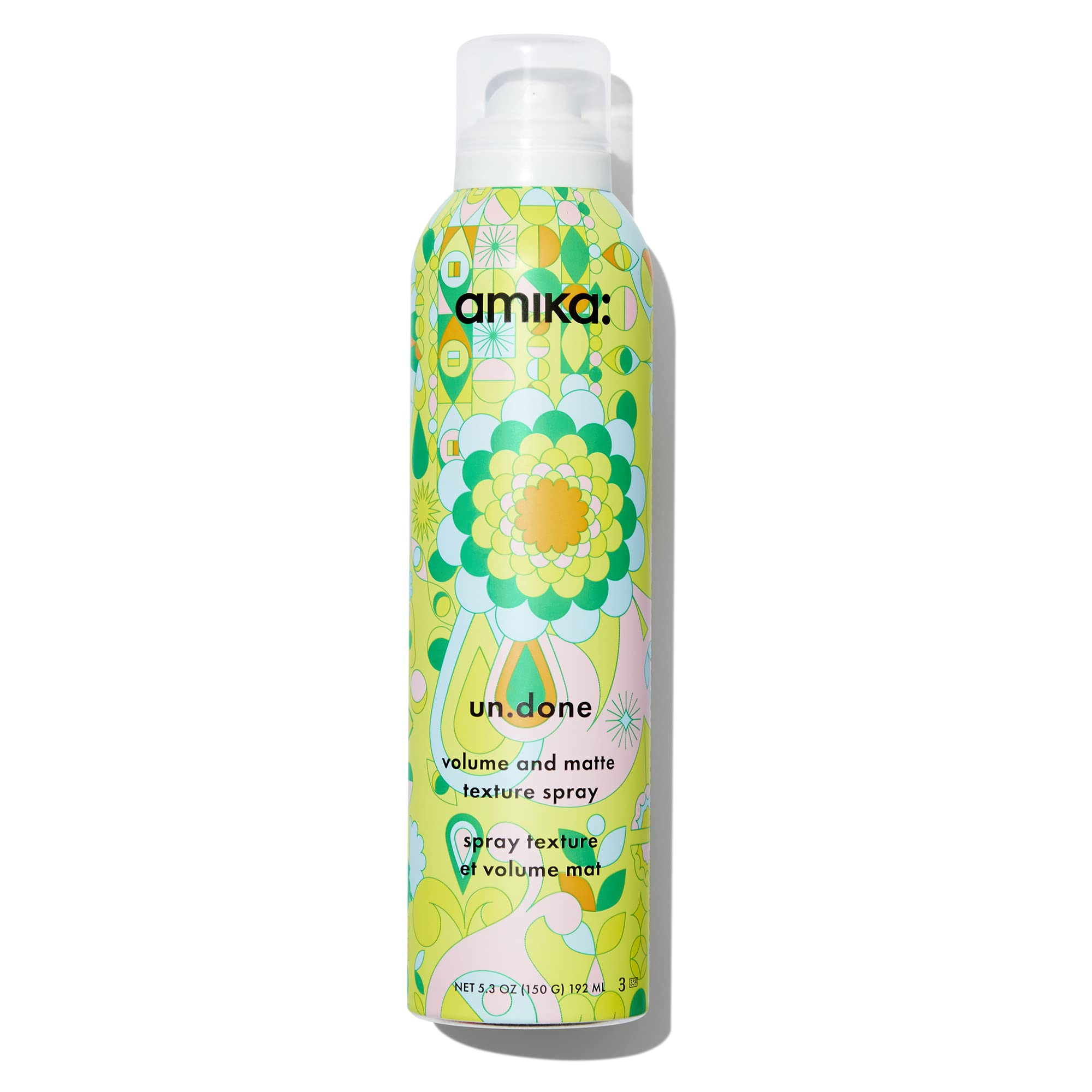 amika Un.Done volume spray bottle pour showing instant lift and beachy texture