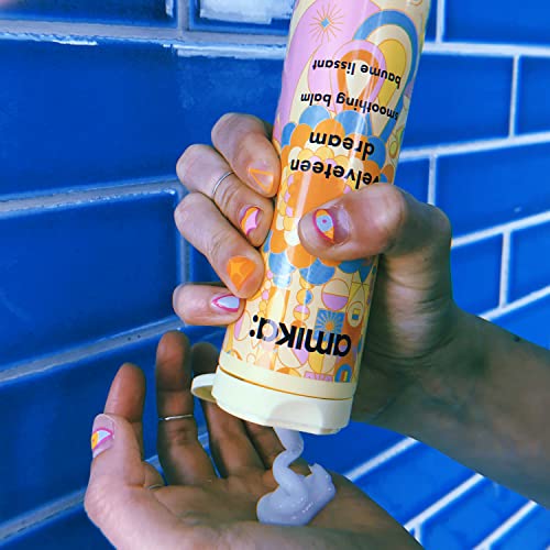sleek, soft finish after using amika Velveteen Dream smoothing balm on all hair types