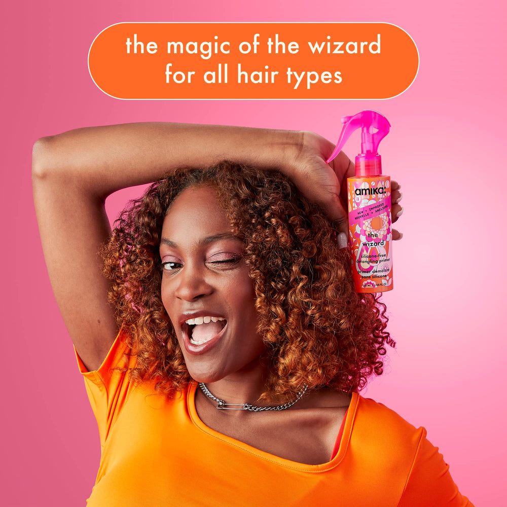 Amika Wizard bottle seen in routine prep before blow-drying and styling.