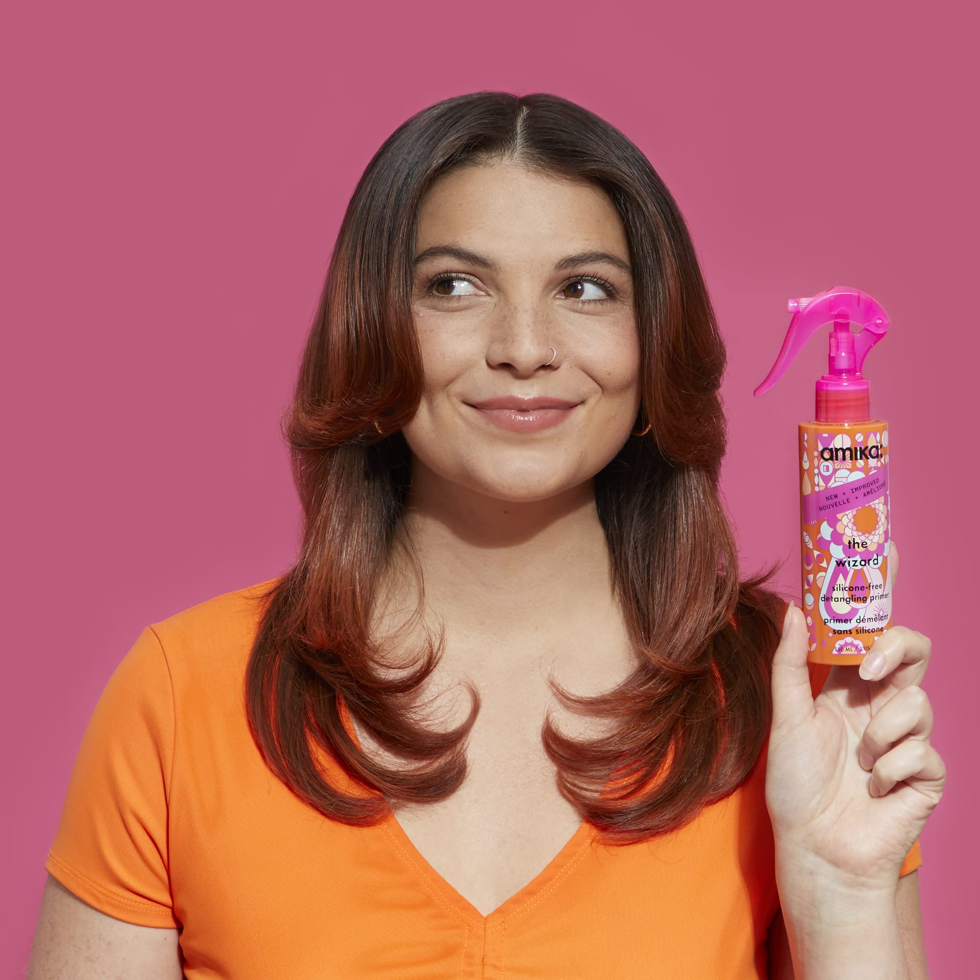 Amika Wizard close-up showcases a silicone-free formula and easy glide.