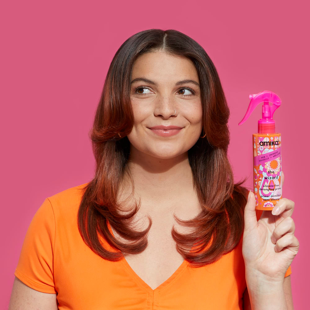 Amika Wizard close-up showcases a silicone-free formula and easy glide.