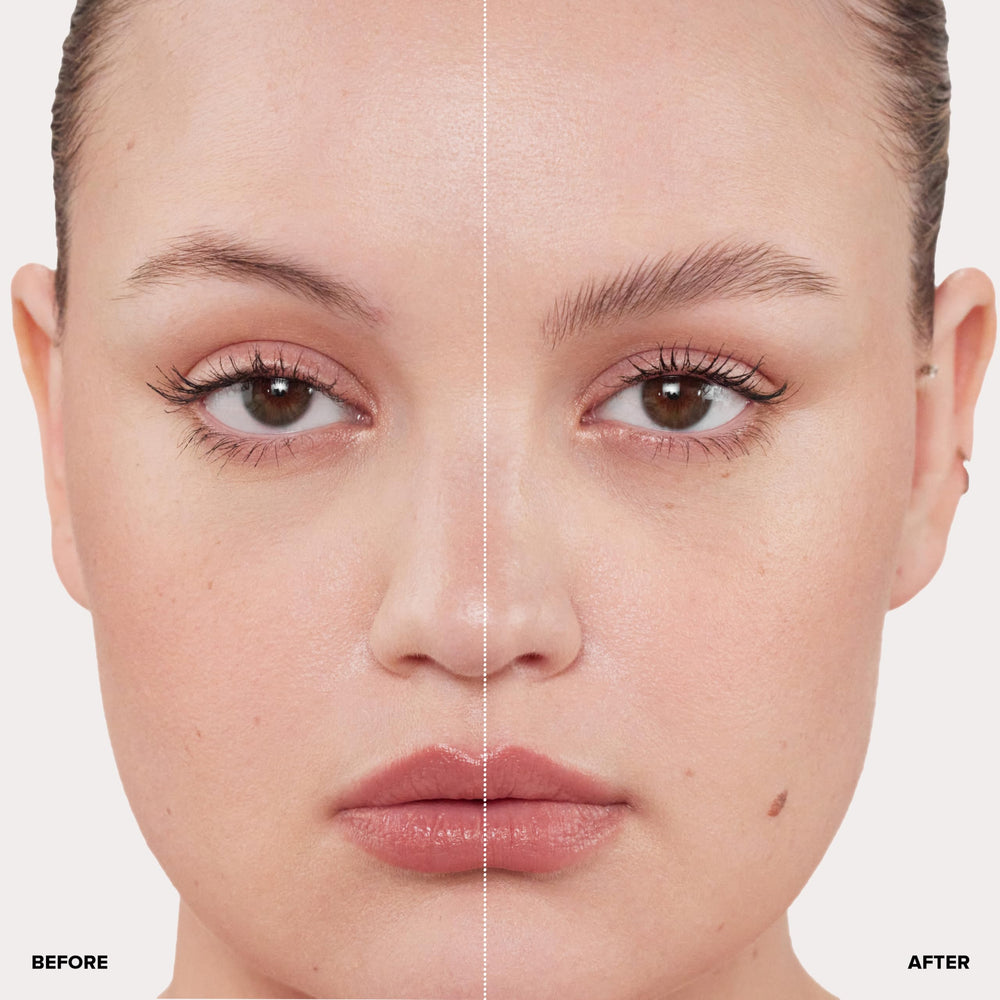 Anastasia Beverly Hills Clear Brow Gel applicator brush applying clear gel to control brow hairs.