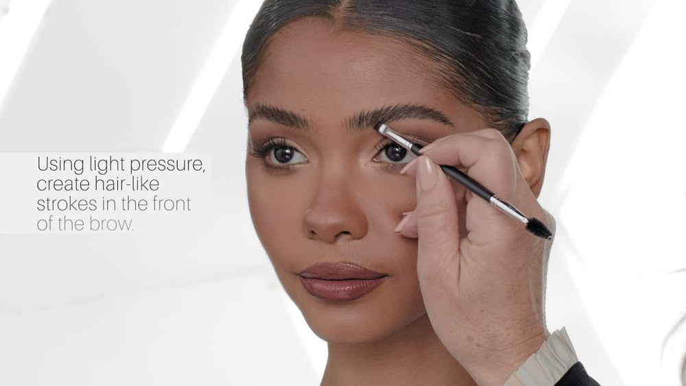 Duo Brush #12 used with DIPBROW Pomade for precise arch definition