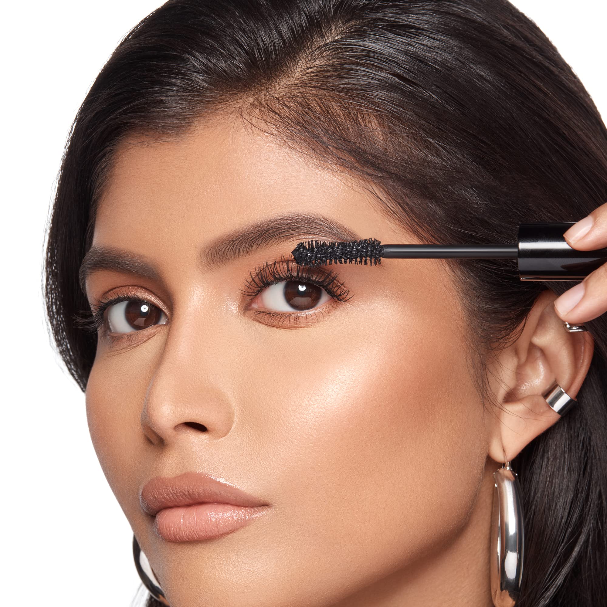 Lashes enhanced with Anastasia Beverly Hills Mini Lash Brag mascara for dramatic volume.