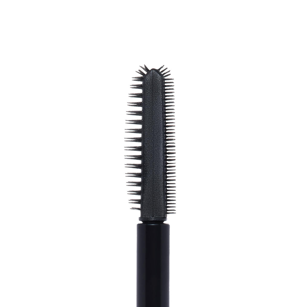 Anastasia Brow Freeze Gel brush during application with defined, groomed brow.