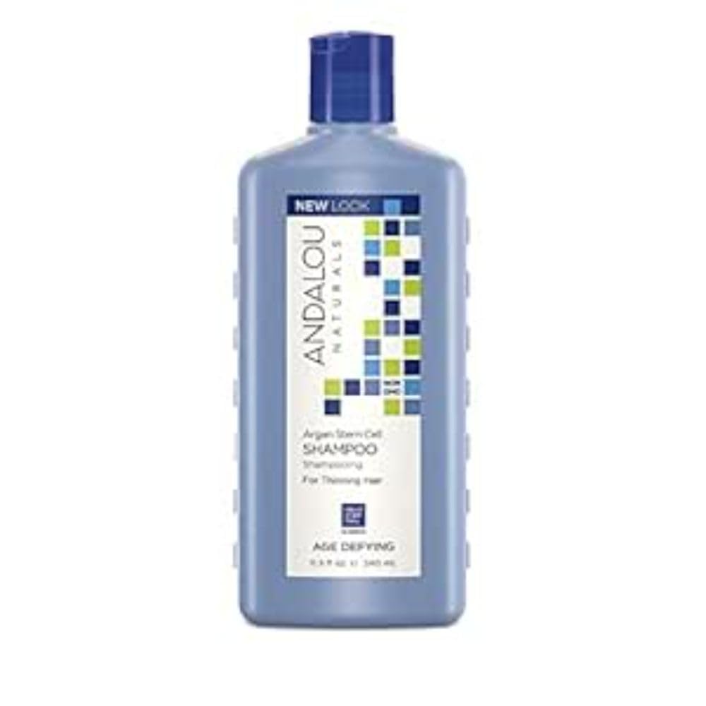 Andalou Naturals Argan Stem Cell Shampoo bottle promoting fuller-looking hair and vitality.