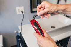 Andis adjustable trimmer combs 3–7 mm and 8–12 mm for precise styles.