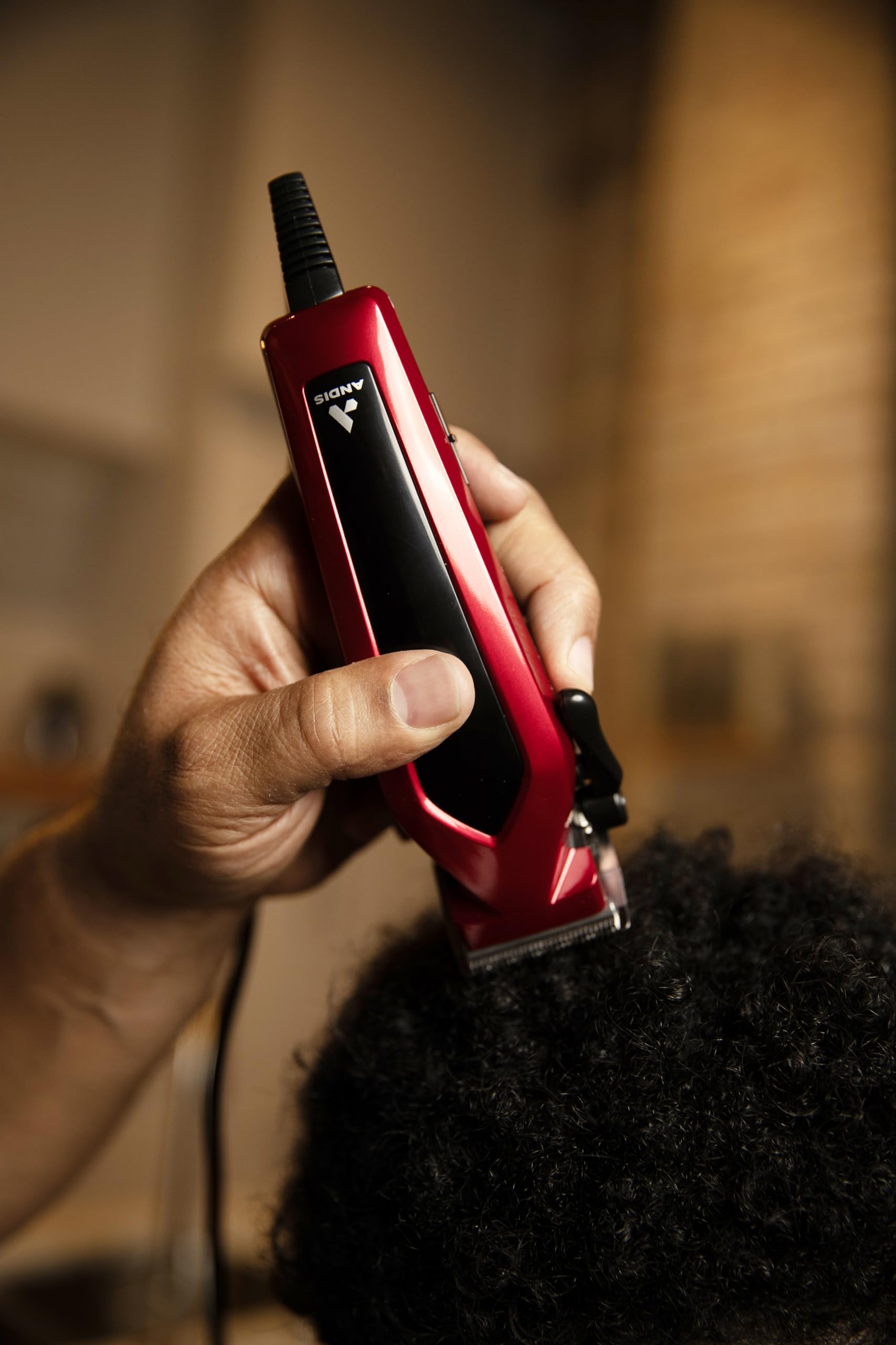 Andis cleaning brush promotes easy maintenance for lasting performance.
