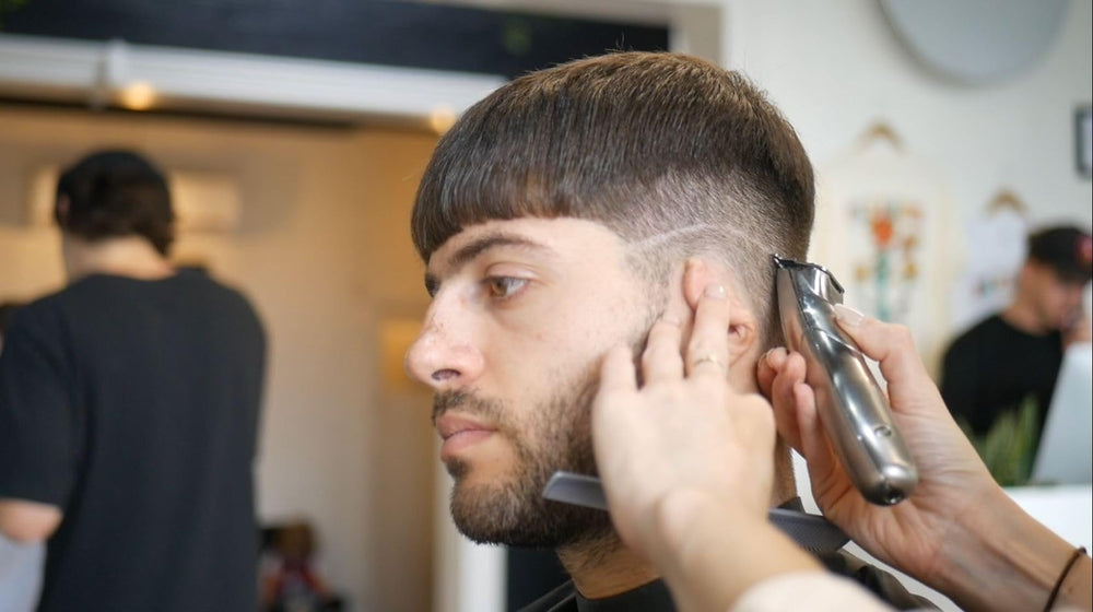 Andis Slimline Pro Li Trimmer with four attachment combs expands styling options
