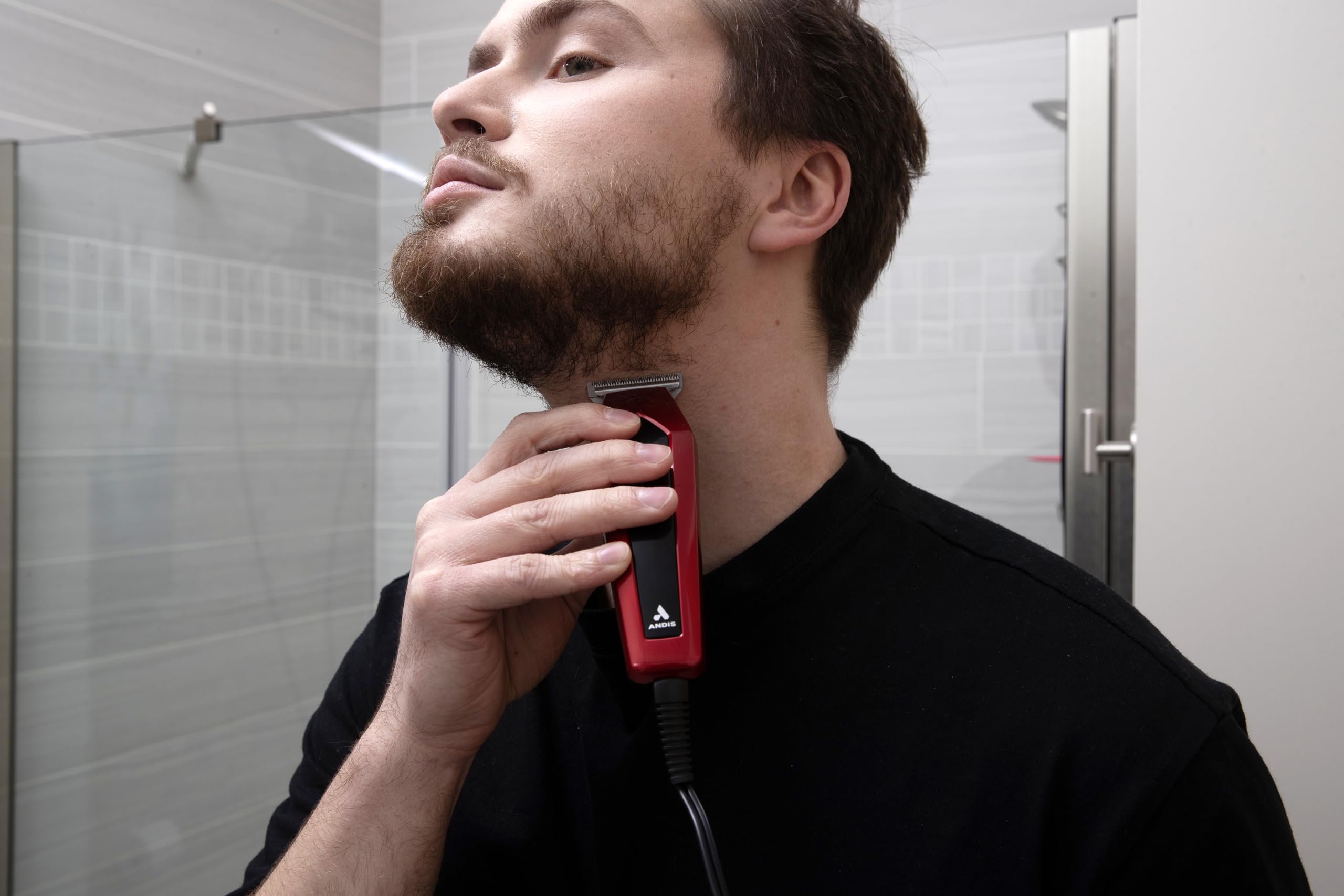 Andis soft storage case keeps all parts organized for home grooming.