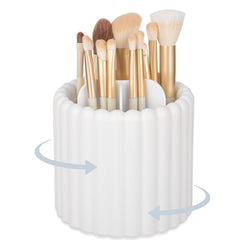 Anyoifax 360 rotating makeup brush holder with 7 slots keeps brushes neatly organized.