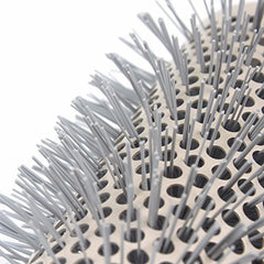 Aozzy round brush 32mm barrel delivers soft curls with a glossy finish.