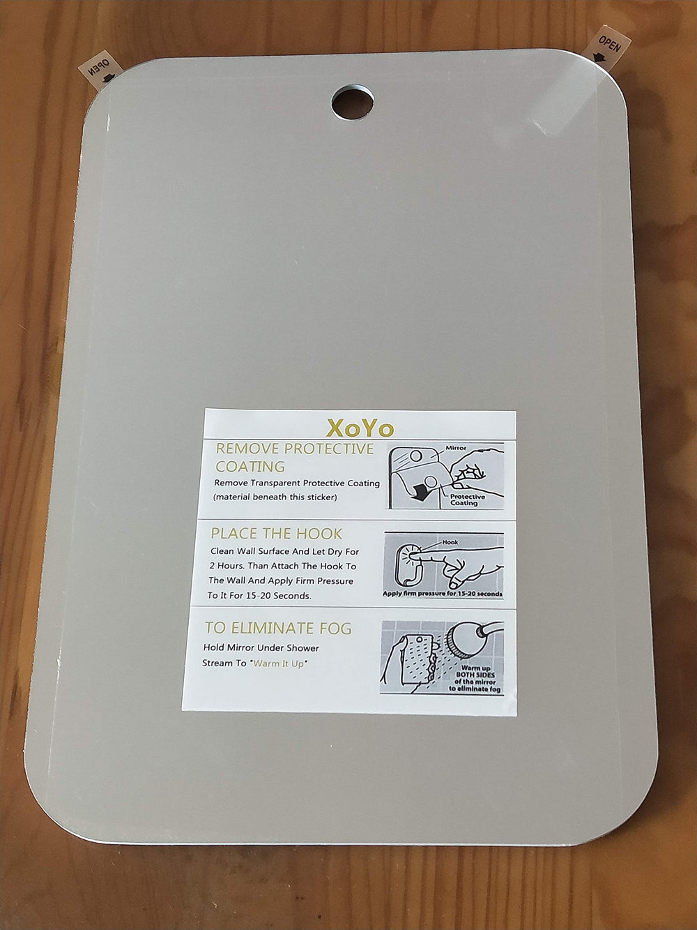 APHUIME fogless mirror with protective film removal before use.