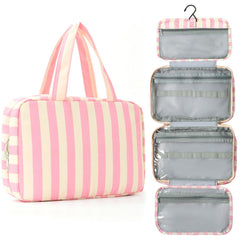 Apxouans toiletry bag for women with pink waterproof fabric and sturdy stitching for travel.