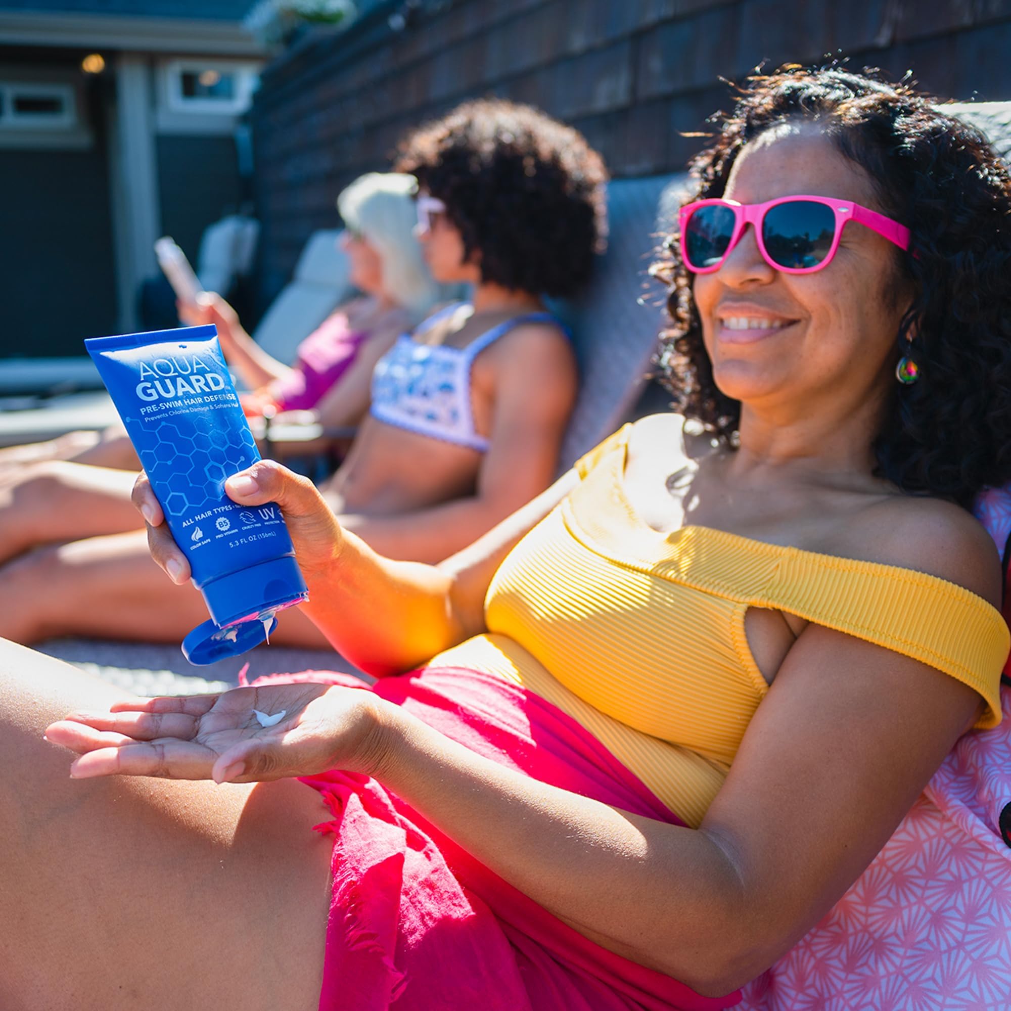 AQUA GUARD pre-swim hair defense color-safe formula preserves natural color while swimming.