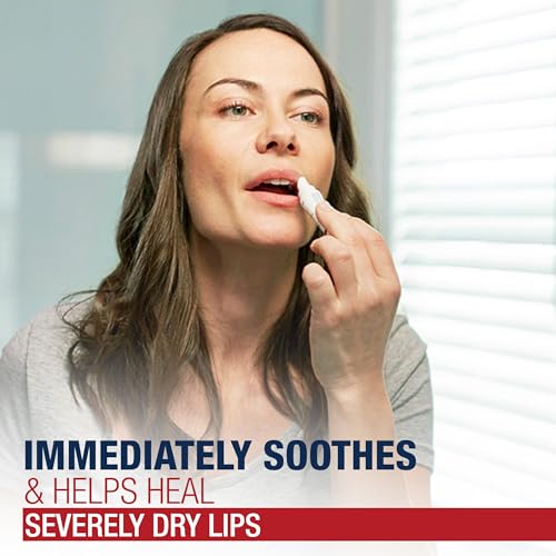 Open Aquaphor Lip Repair tube ready to glide on lips.