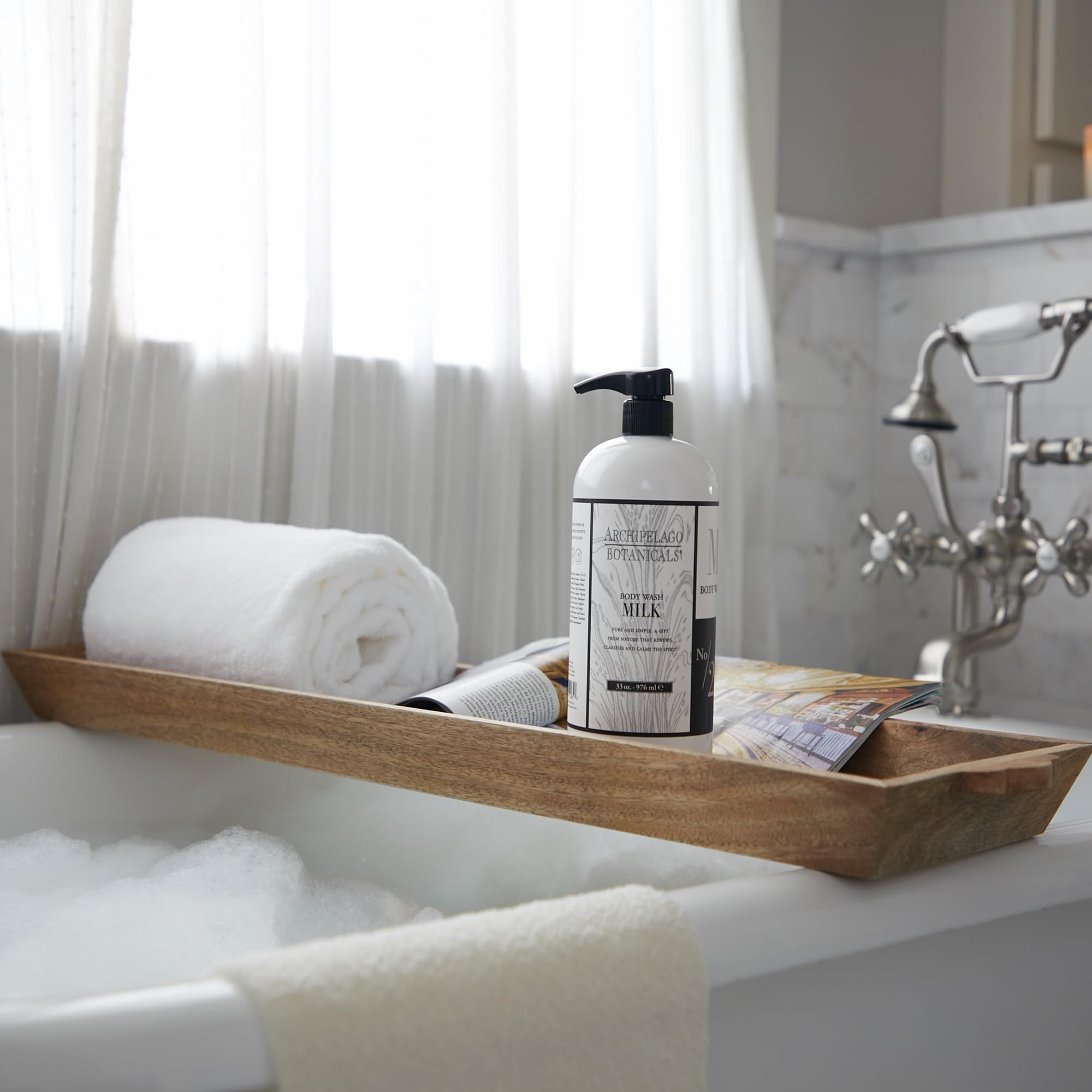 Archipelago Botanicals Milk Body Wash close-up texture reveals creamy lather and gentle cleansing.