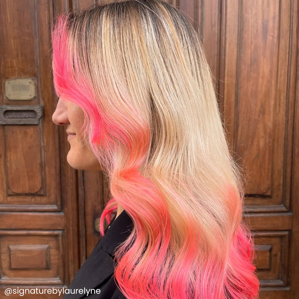 ARCTIC FOX Electric Paradise streaked hair swatch demonstrates customizable intensity.