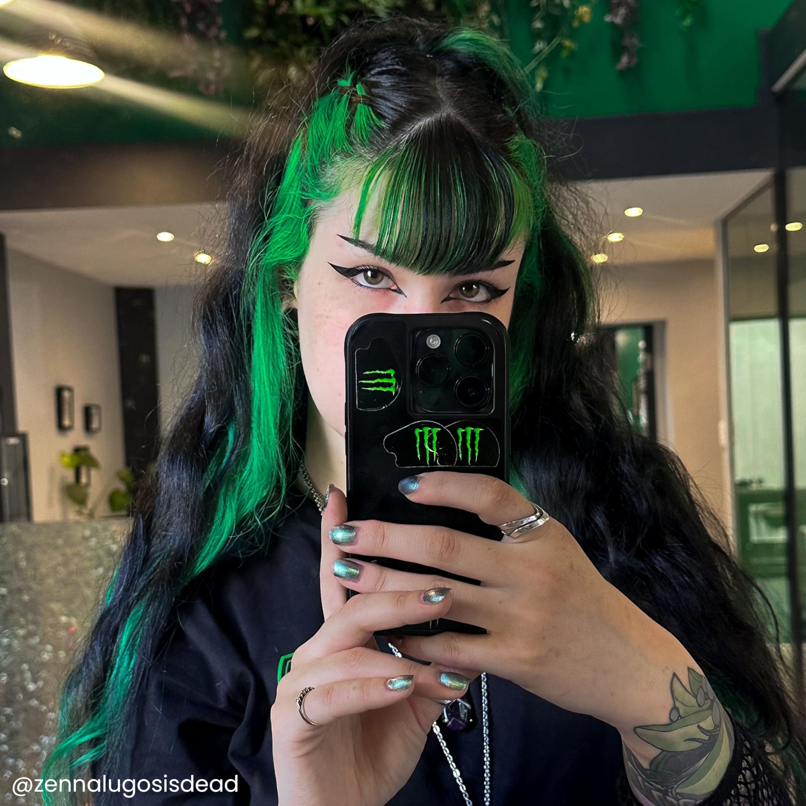 Arctic Fox Phantom Green on dark hair reveals subtle emerald tint.
