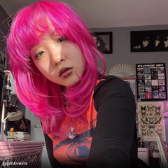 Applying Virgin Pink on hair demonstrates easy, even coverage.