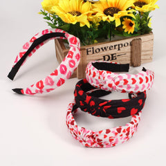 Ardorchid handmade heart headband offers a cute, comfortable accent.