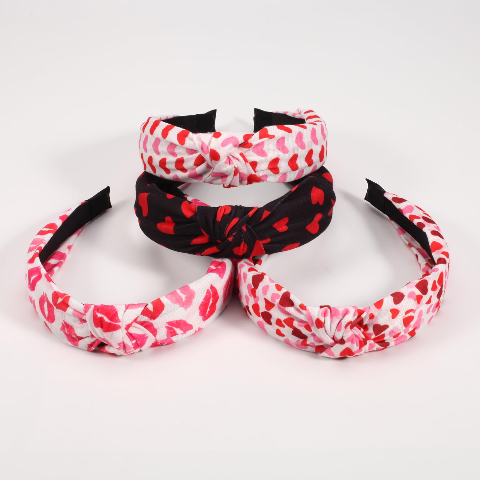 Ardorchid knot-detail headband adds a playful romantic touch.