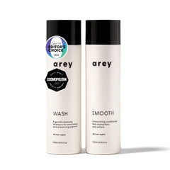 Arey Shower Duo daily wash shampoo bottle with pigment-preserving formula.