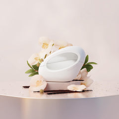 Ariana Grande MOD Vanilla packaging display showcases cruelty-free vegan fragrance appeal.