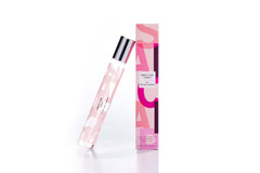 Ariana Grande Sweet Like Candy rollerball bottle, ideal for on-the-go fruity fragrance.