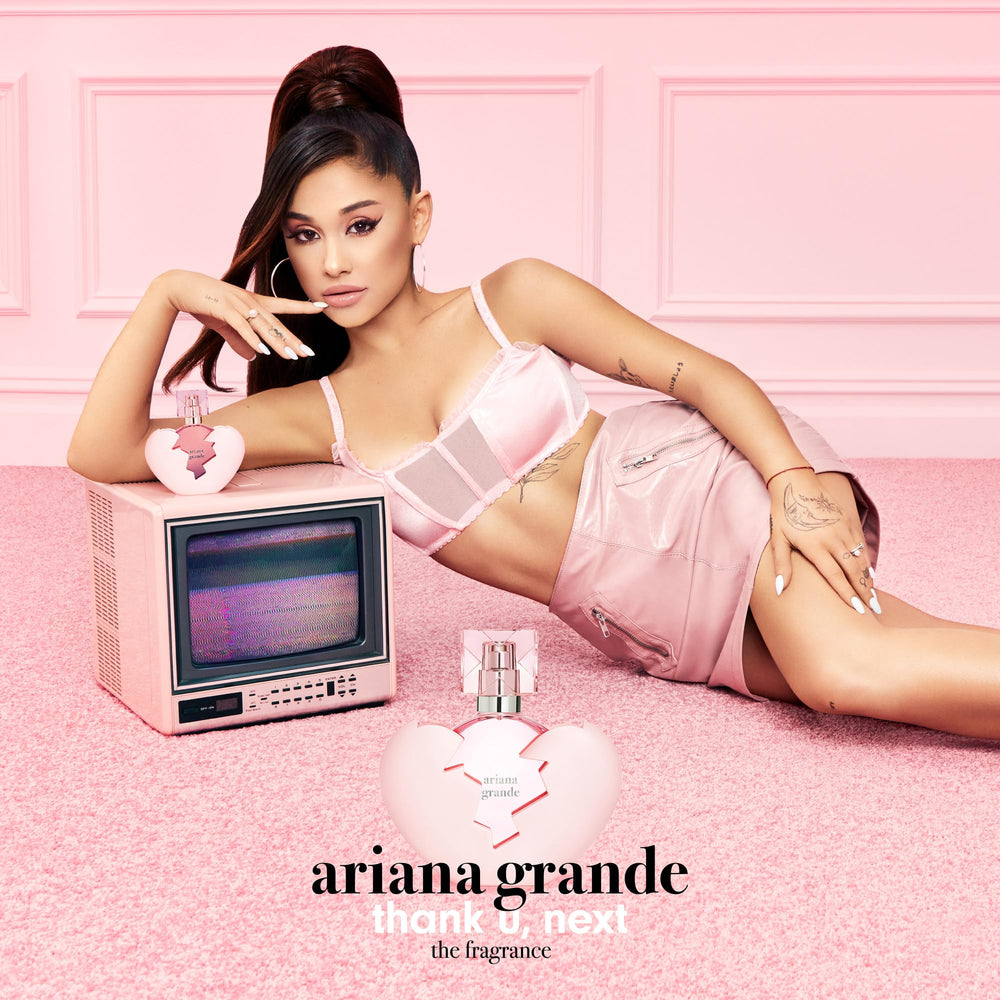 Ariana Grande Thank U Next notes of white pear and raspberry in a sleek bottle for daily wear.