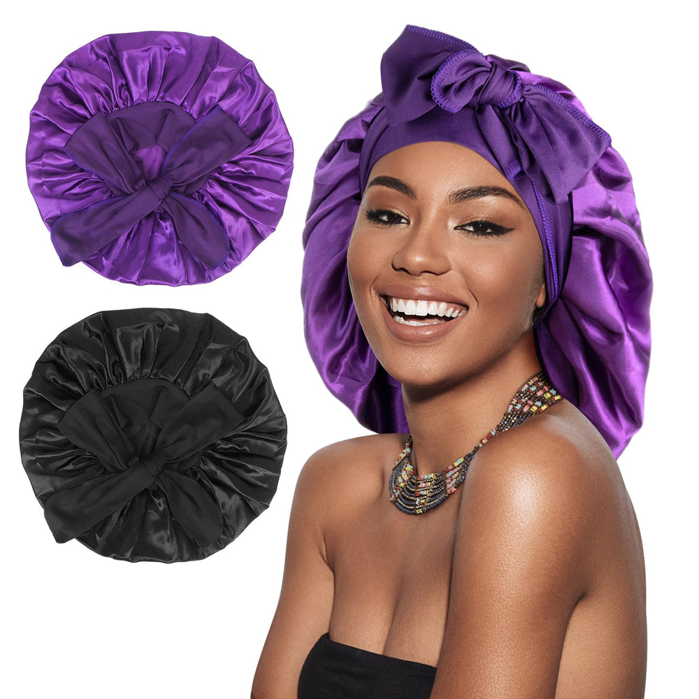 Arqumi satin sleep bonnet in black with a long band for secure overnight wear.