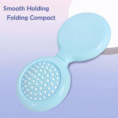 Arthaxi mini hairbrush with compact mirror ideal for quick touch-ups.