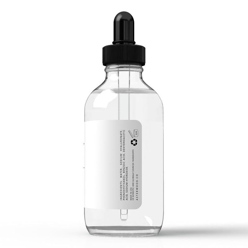 Close-up of clear serum texture ready for layering with moisturizer.