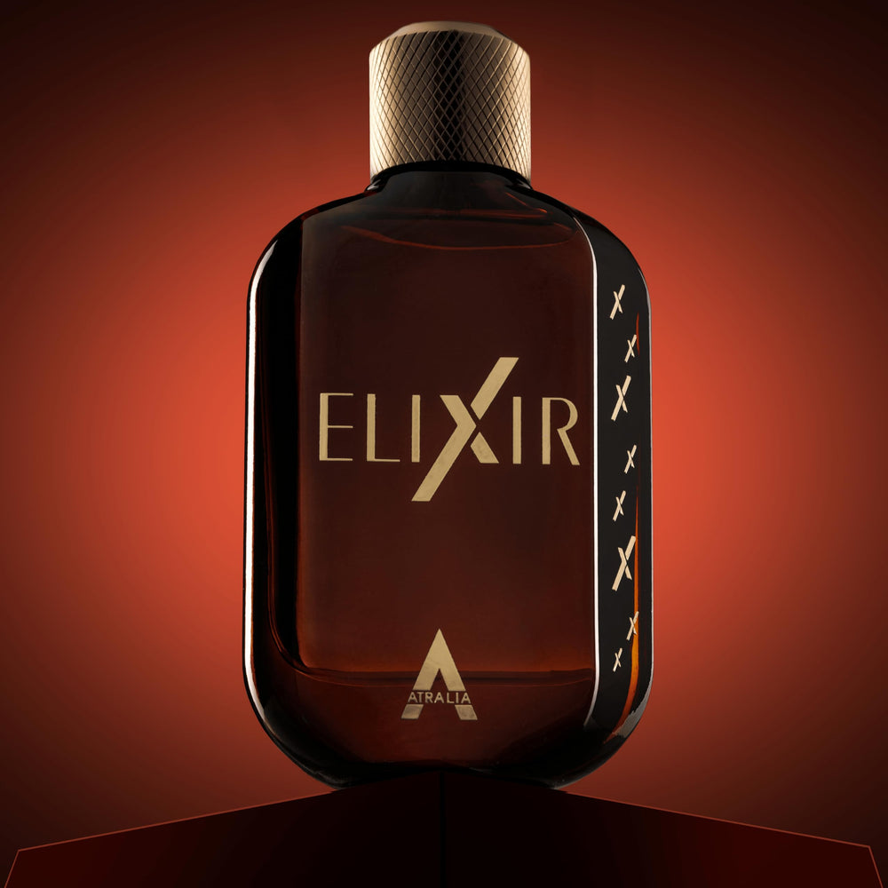 Atralia Elixir amber heart closeup, warm core suggesting lasting depth.