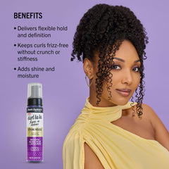 Hands applying Curl La La Foam-a-licious to curls for definition