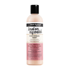 Aunt Jackie's Knot On My Watch bottle pour demonstrates easy detangling for wet hair.