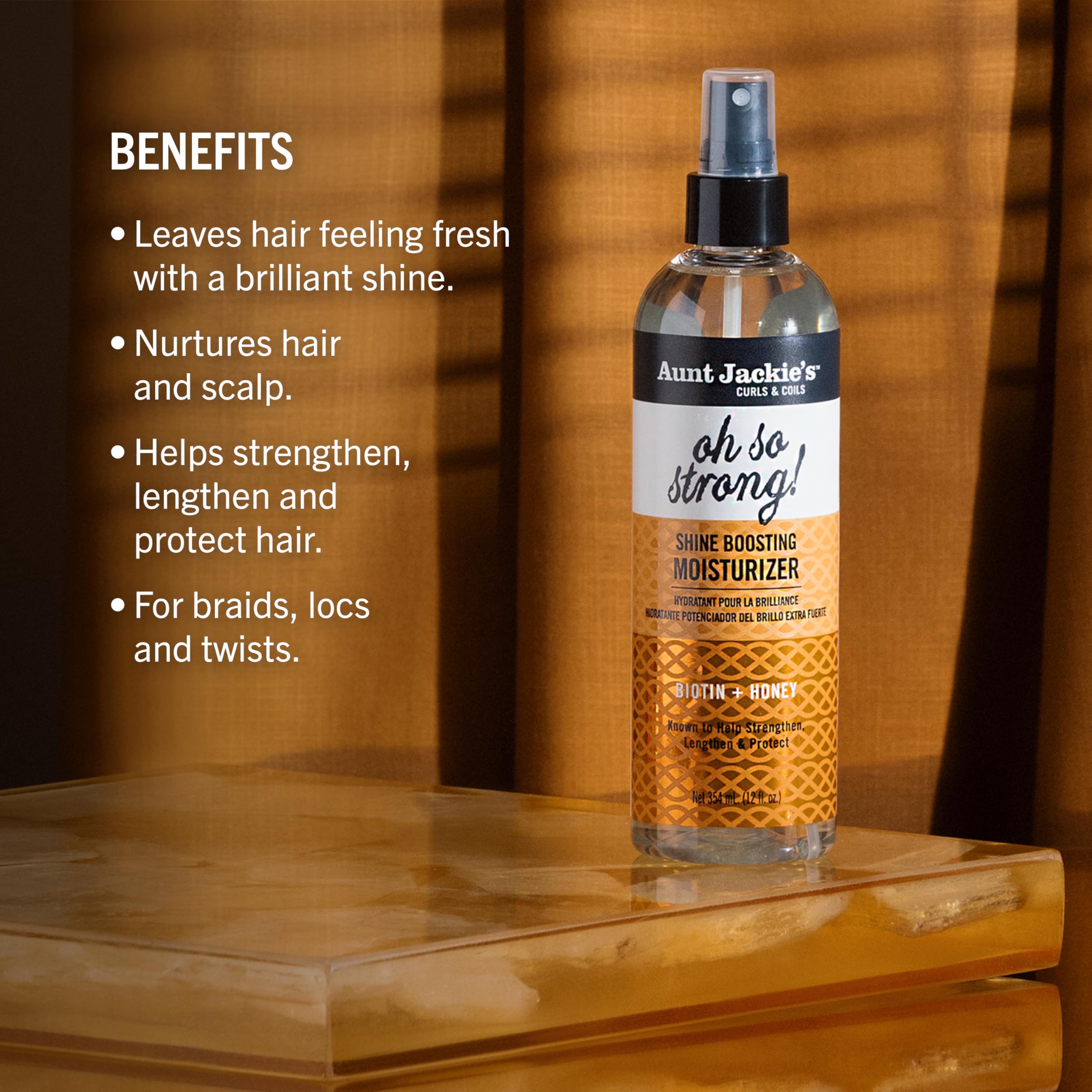 Aunt Jackie's Oh So Strong honey gloss on hair smoothing the strand