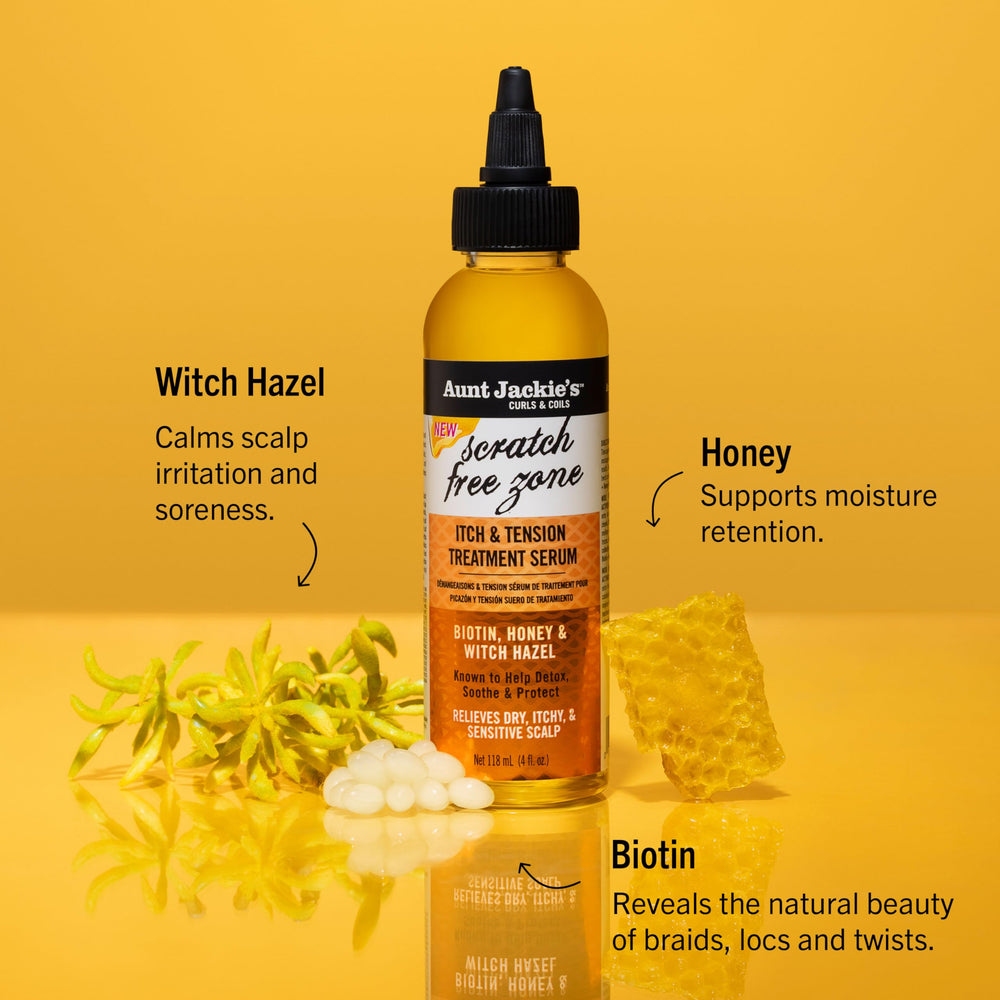 Aunt Jackie's Scratch Free Zone Serum applied to scalp.