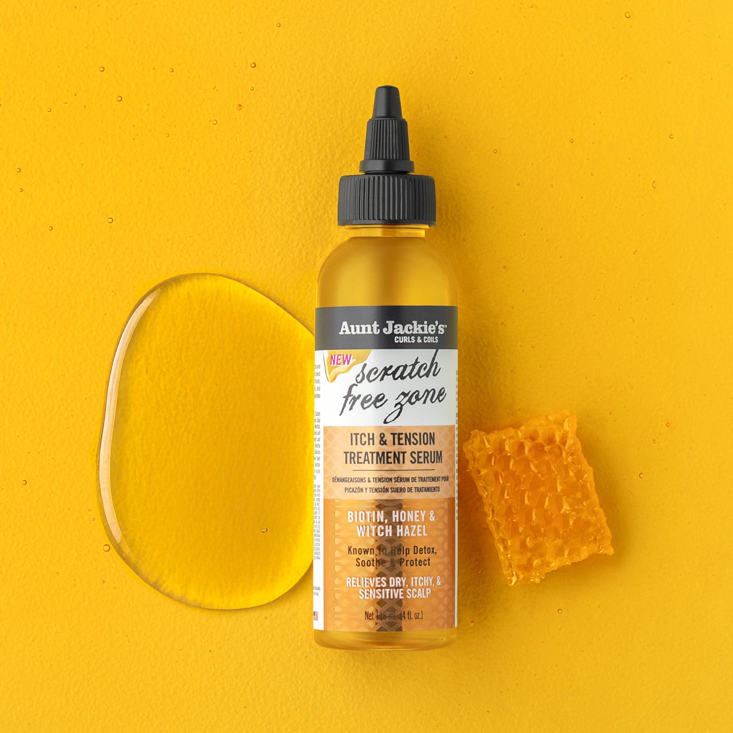 Aunt Jackie's serum applied to scalp under braids.
