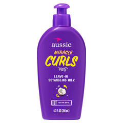 Aussie Miracle Curls detangling milk bottle eases knot-prone curls.