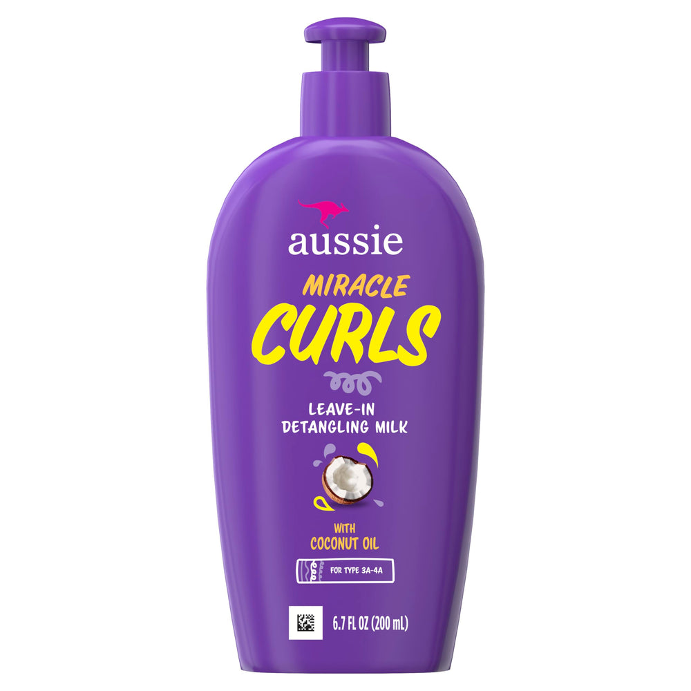 Soft, defined curls ready to air-dry after using Aussie Miracle Curls.