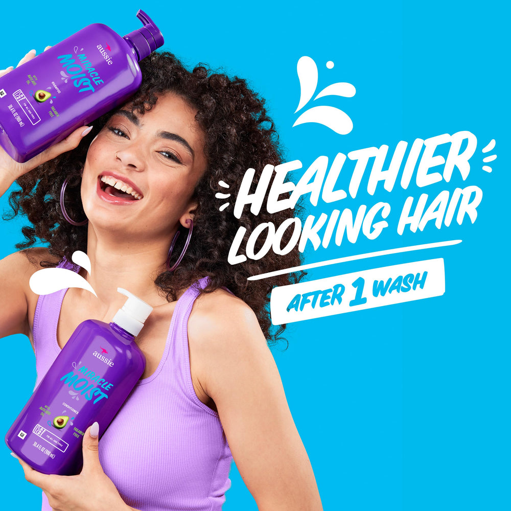 Aussie Miracle Moist Shampoo lather on hair with healthy shine