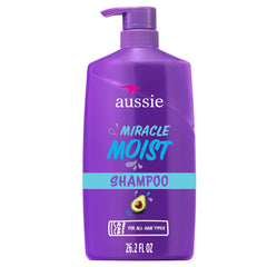 Aussie Champú Milagro Hidratante en botella, hidrata profundamente desde la primera lavada.
