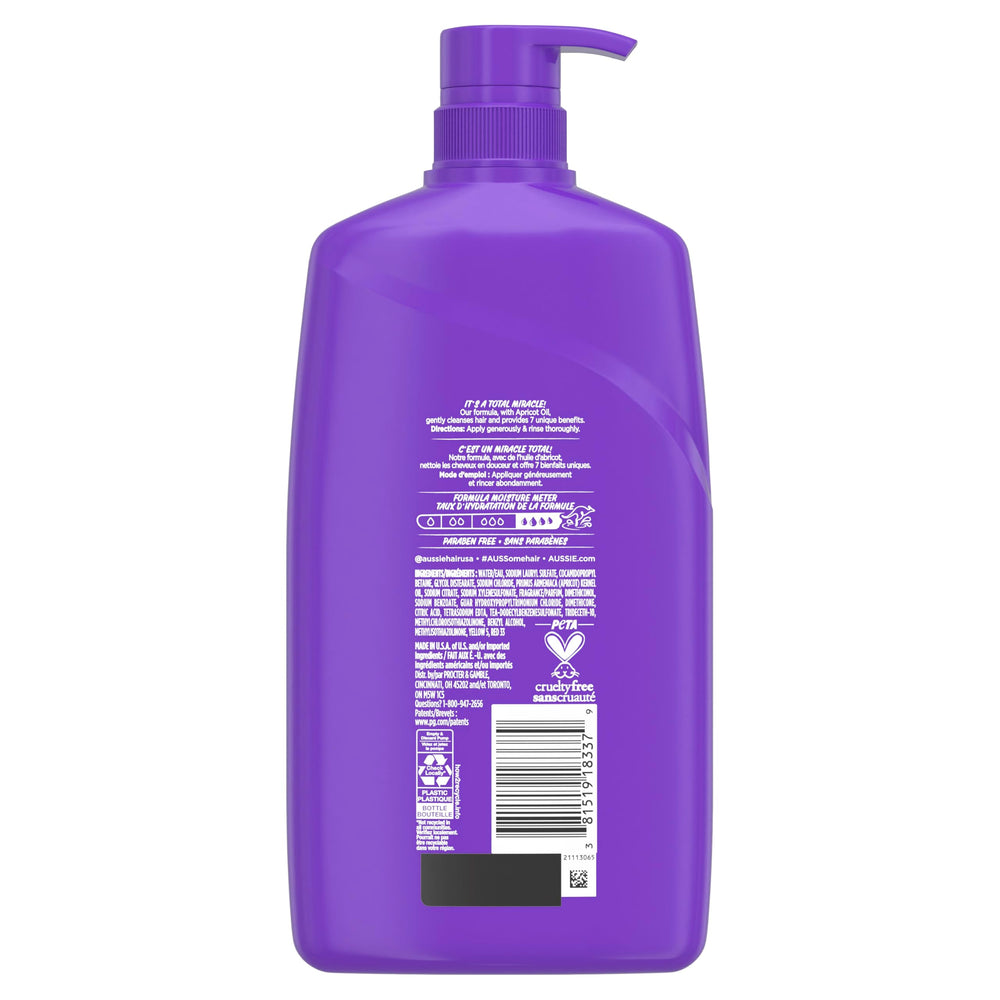 Aussie Total Miracle 7N1 Shampoo on shower shelf protecting split ends and humidity