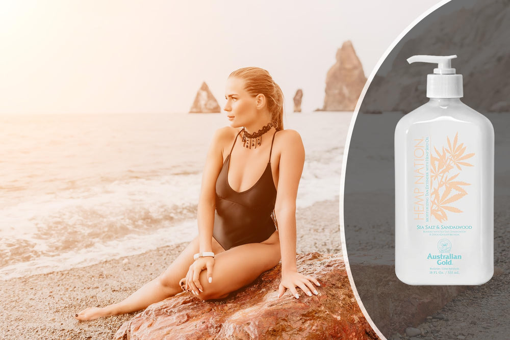 Australian Gold Hemp Nation bottle pictured during a beach stroll with sun glow.