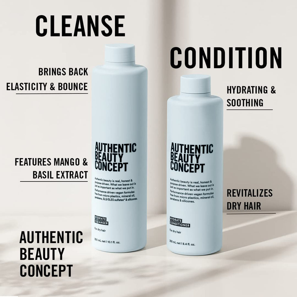 Authentic Beauty Concept Hydrate conditioner being applied to damp hair for smooth detangling