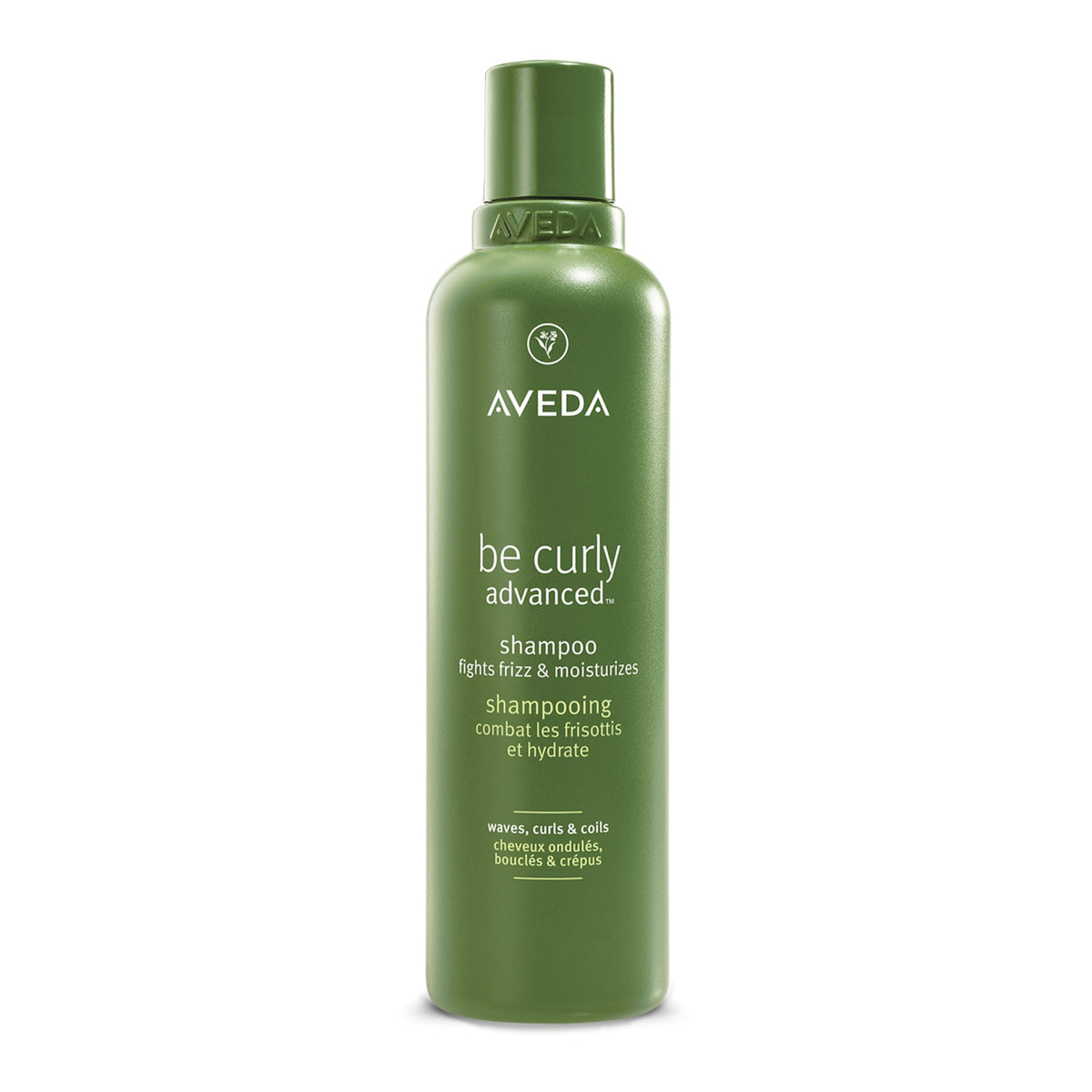 Aveda Be Curly Advanced Shampoo bottle close-up with citrus aroma for frizz control.