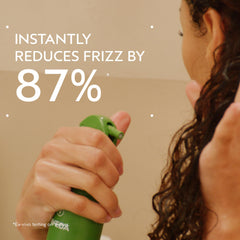 Be Curly primer dispenser close-up highlighting lightweight leave-in texture.